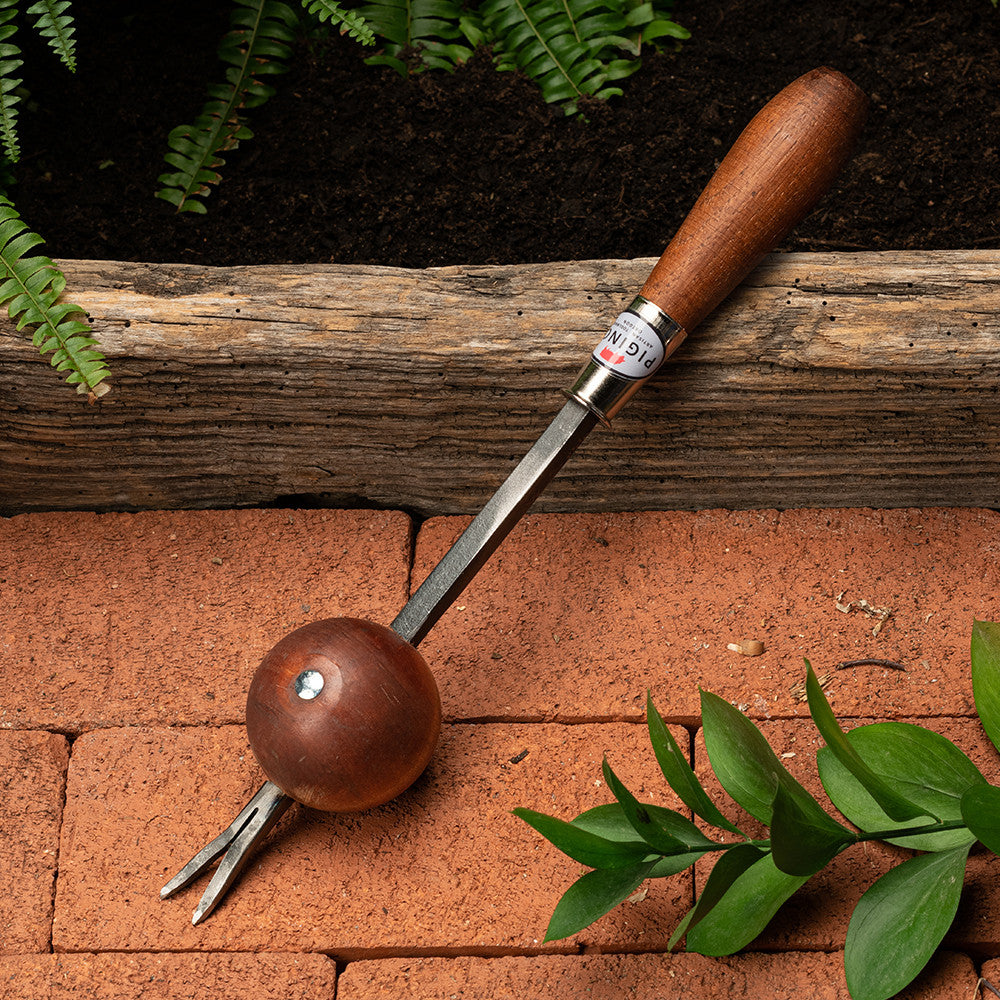 Red Pig Ball Weeder